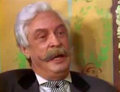   - ", !" (1976)