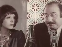 ",   !" (1977)