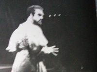   (VI)