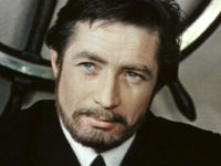     (1977)