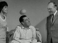   (1963)