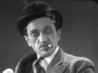   (1933)