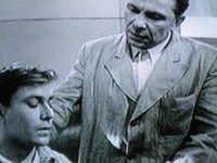    (1961)