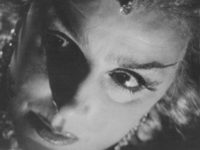   (-) (1964)