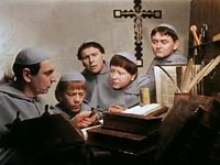 слева, роль брат Йероним